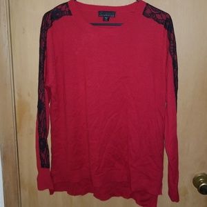 Red sweater black lace down arms
